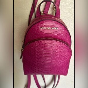 Michael Kors Abbey XS Backpack Crossbody Fuchsia Pink Embossed Leather NEW - NWT